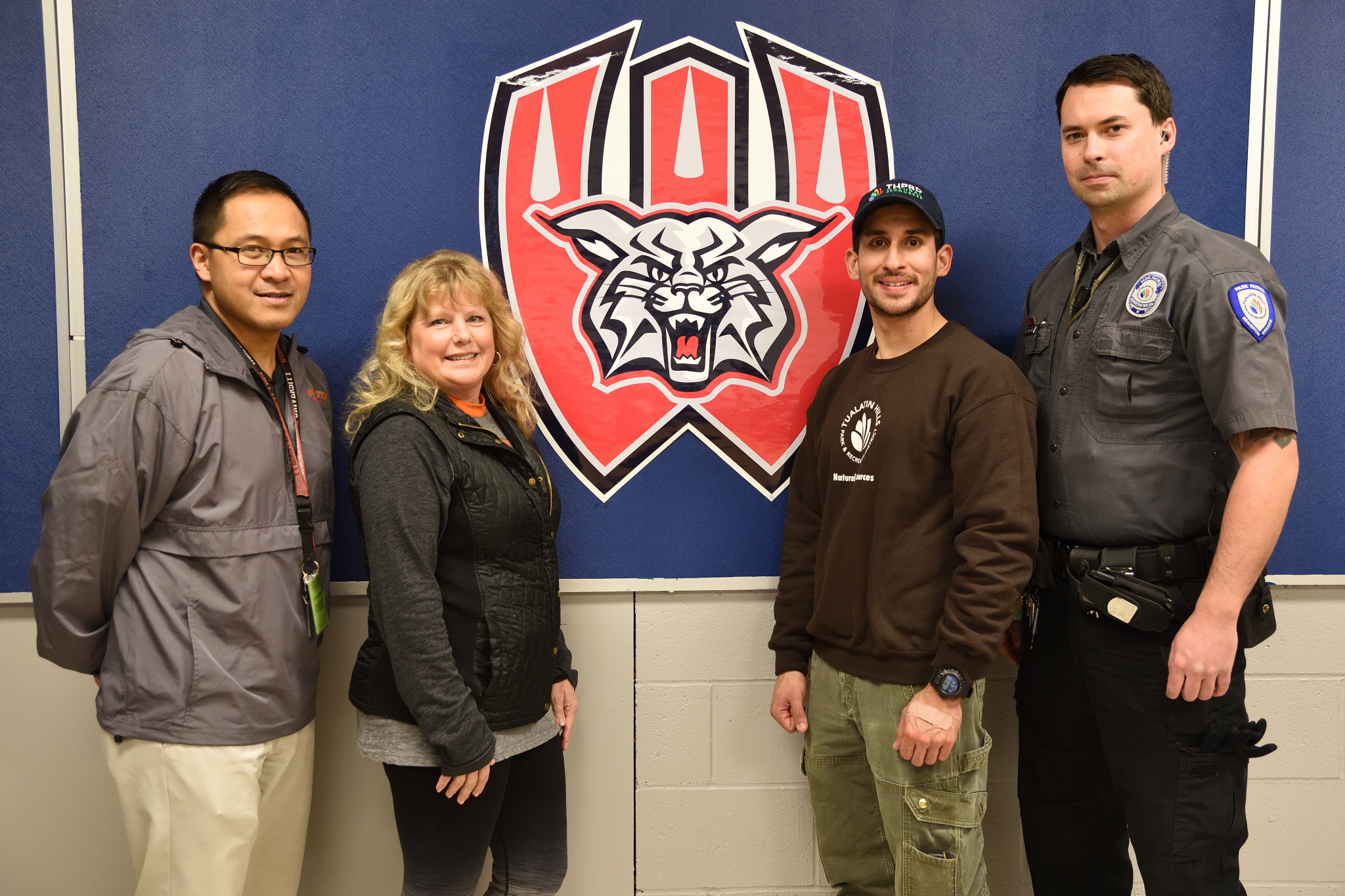 Westview officials thank THPRD staff for returning stolen iPads to the school. At left are Dr. Jon Franco, principal; and Brenda Renning, technical support specialist. On the right are THPRD’s Panos Stratis, who found the iPads; and Brady Schwartz, who turned them over to police.